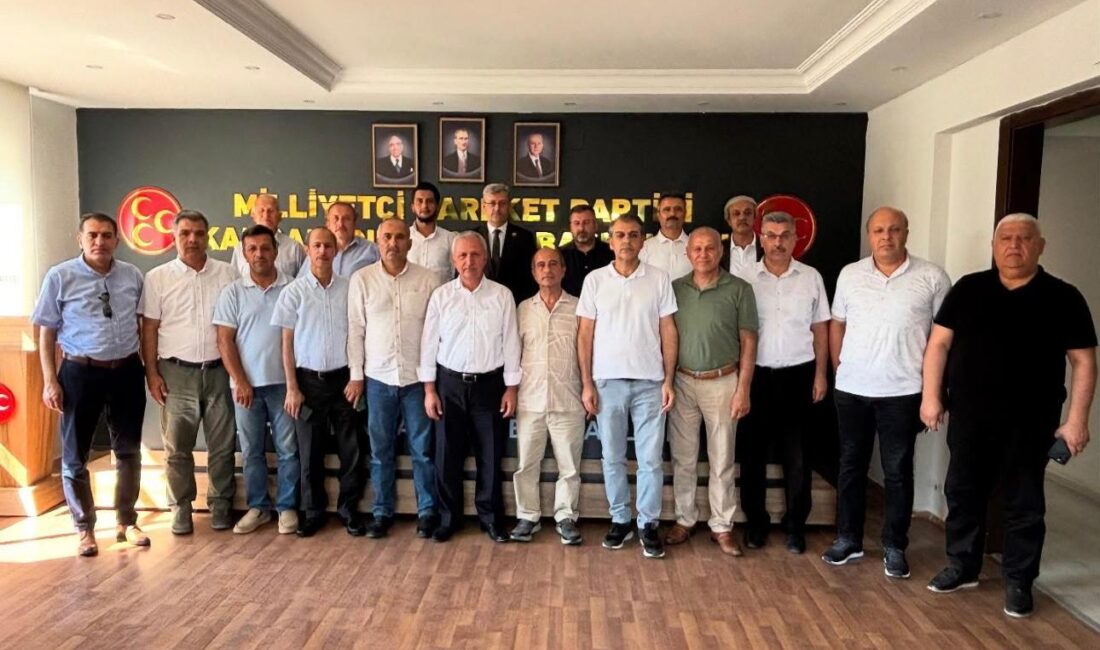 Türkoğlu Dostluk Platformu üyeleri, görevlerine yeni başlayan Milliyetçi Hareket Partisi